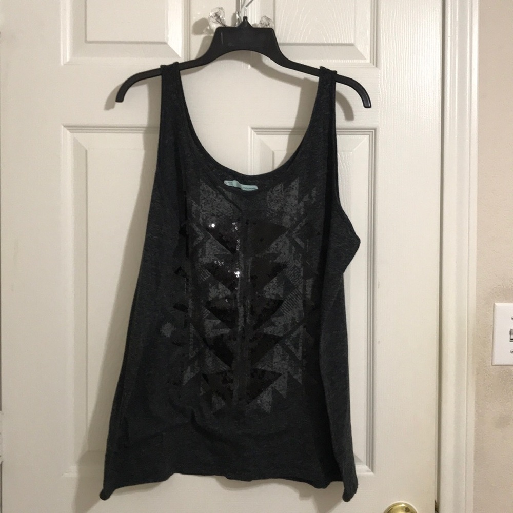 Tank blouse with sequence detail.